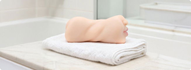 Clean Onahole on towel